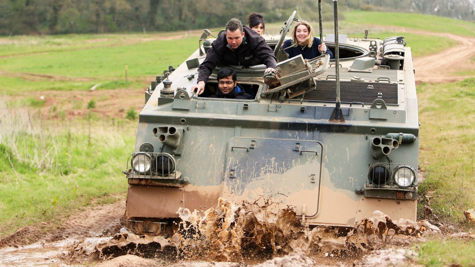 People driving tank at ACF Teambuilding & Events Ltd